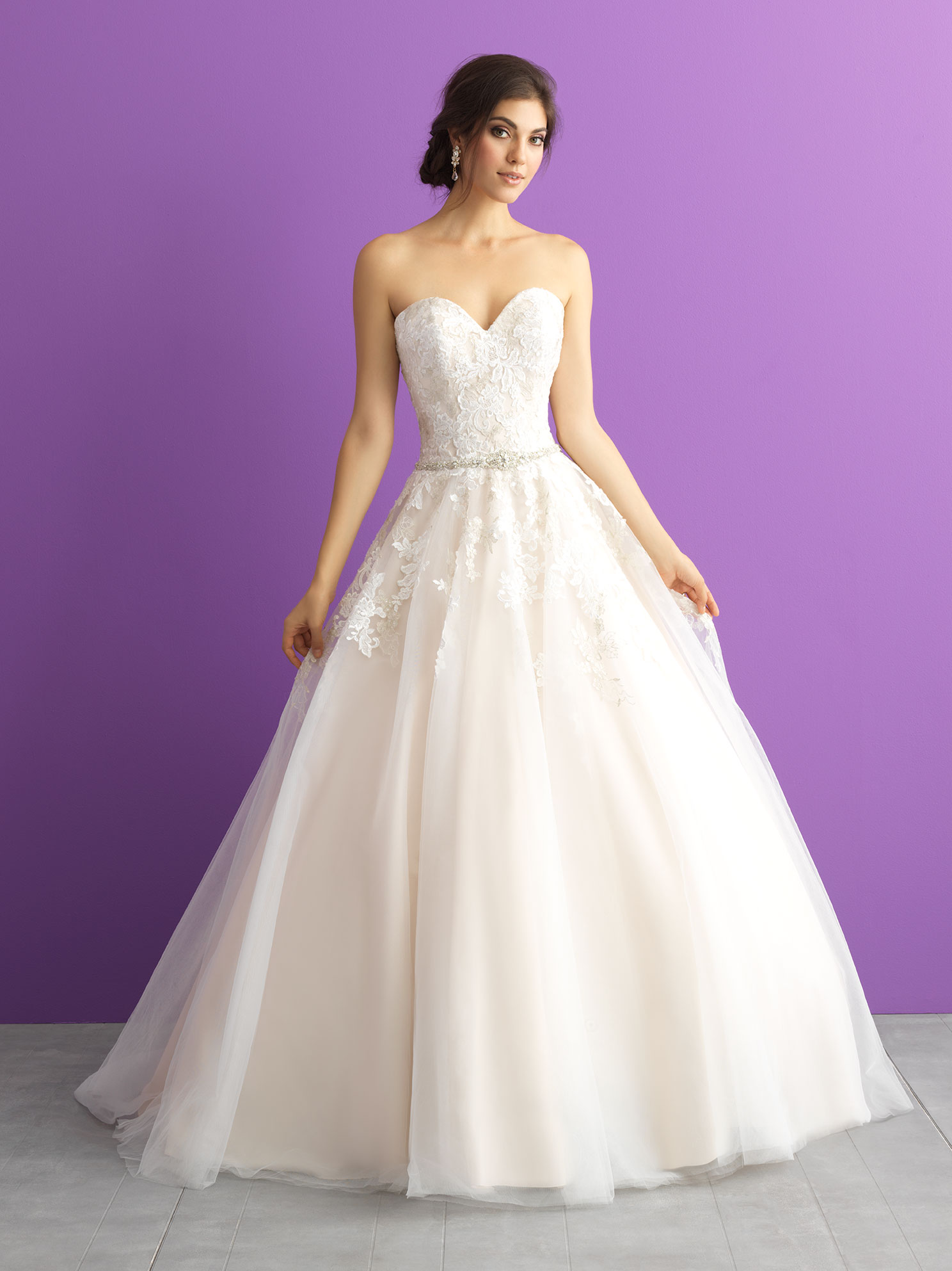 Beautiful David Tutera wedding dress with removable lace jacket.