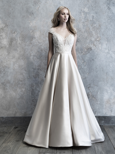 Cap sleeve wedding dress, organza, tulle and hand-beaded re-embroidered lace ball gown with cap sleeves, illusion and lace bateau neckline, softly curved lace appliqué bodice, dropped waist, illusion and lace back bodice with covered button closures.