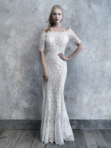 Beaded lace wedding dress, sleeveless tulle and hand-beaded corded lace over luxurious satin fit and flare dress, beaded V-neckline and lace straps, beaded deep plunging scoop back, dropped waistline, scalloped hemline, chapel length train.