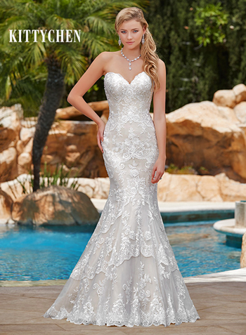 Gorgeous fit and flare wedding dress. Low scoop back.